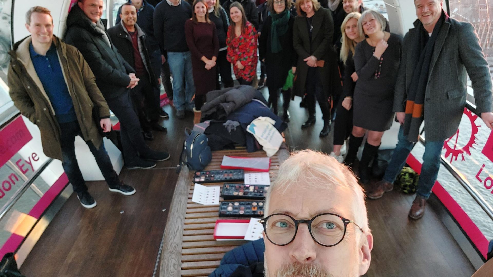 The Apollo team on a team building trip, all in one of the London eye pods