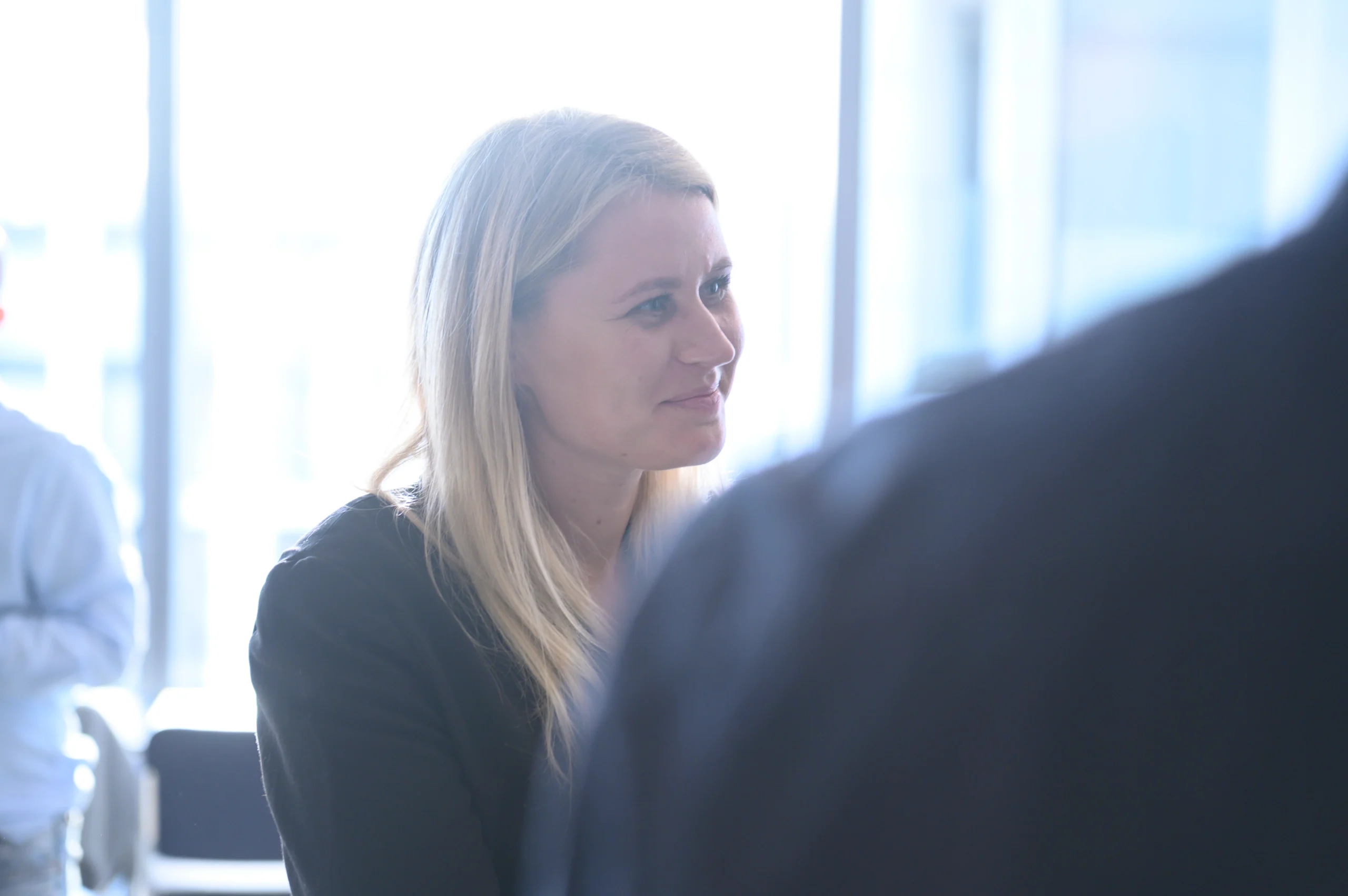 Smiling shot of a finance team member in the office